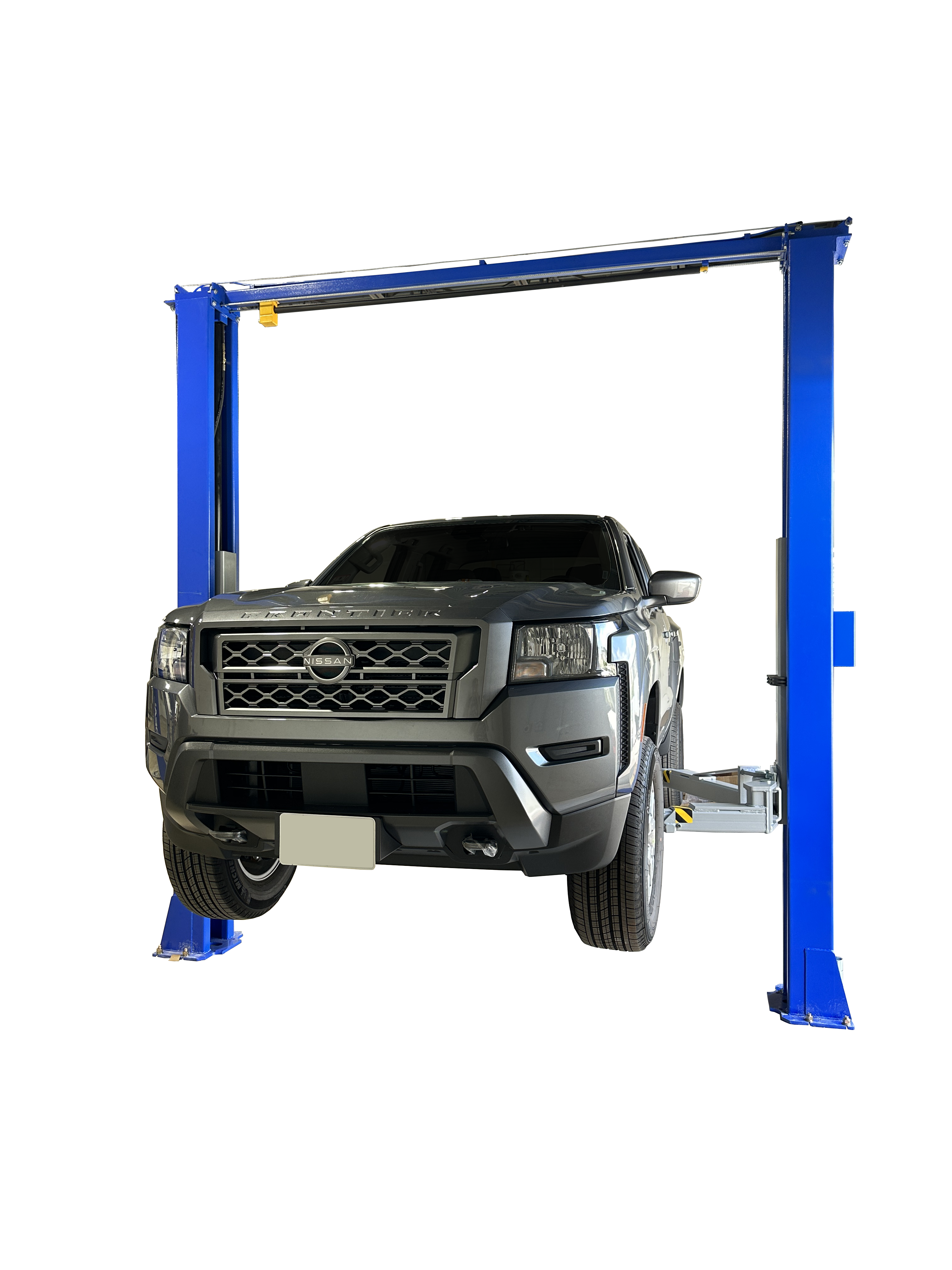Tuxedo TP11KC-DX two-post clear floor lift raising a pickup truck